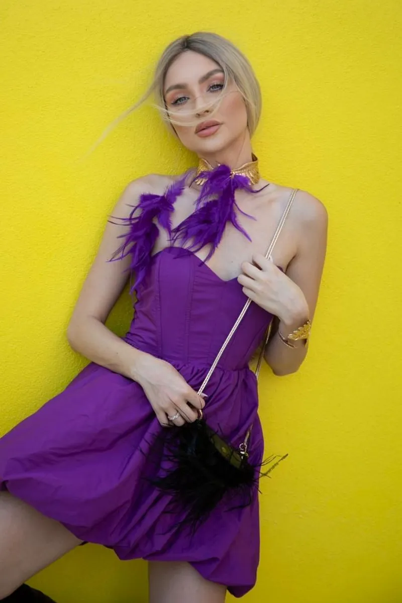 Wendy displaying poise and elegance in a polished portrait