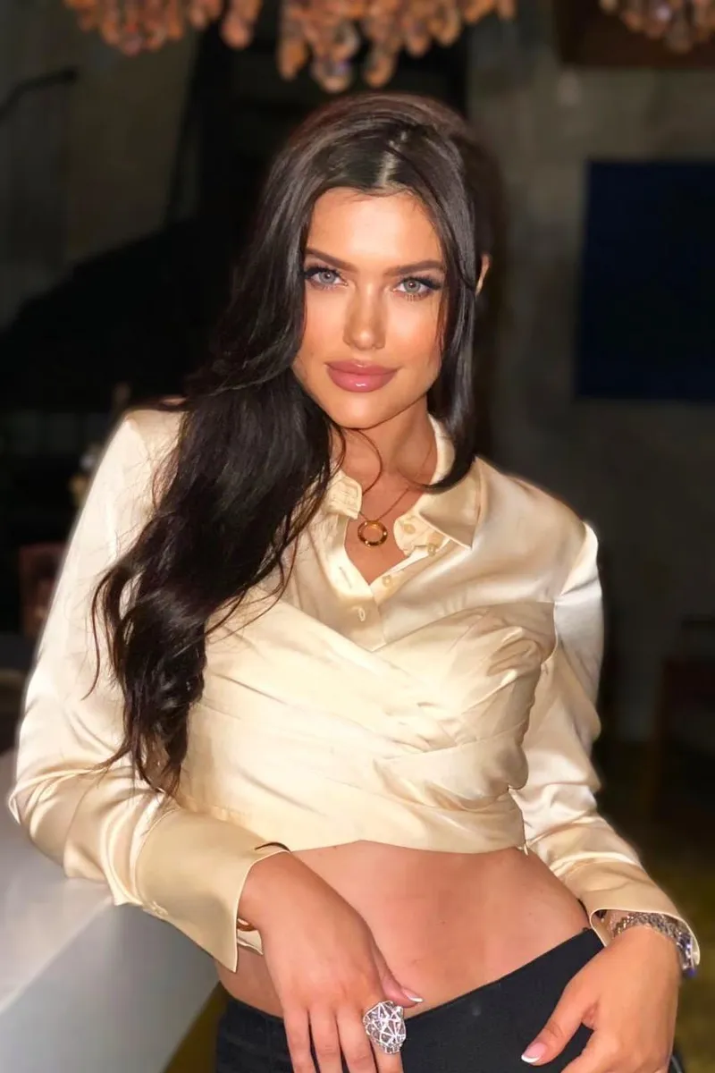 Isabella exuding confidence and sophistication in a graceful pose